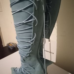 Woman's mid calf Y-project designer boots.         Brand New